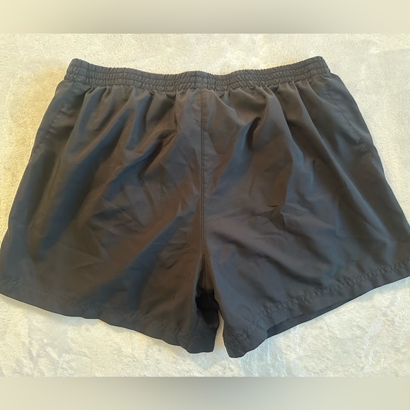 Adidas women’s medium running shorts. Black with 3 stripe in blue. EUC - Picture 4 of 7